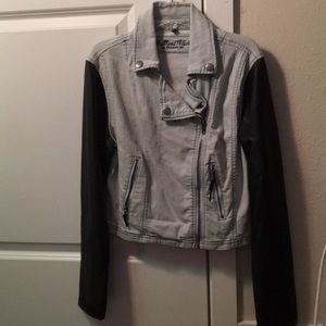 Jean jacket with faux leather sleeves